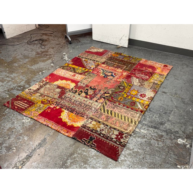 Design Plus Gallery presents a 5ft 9in × 7ft 7in Turkish Patchwork Area Rug. This rug is made from assorted rug sections...