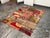 Design Plus Gallery presents a 5ft 9in × 7ft 7in Turkish Patchwork Area Rug. This rug is made from assorted rug sections...