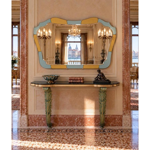 A striking art deco console table and matching mirror dating from the 1930s, distinguished by their elegant geometric...