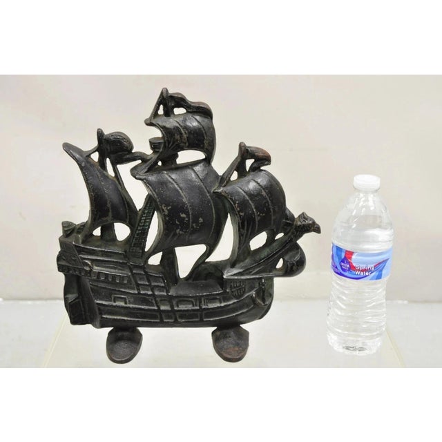 Antique Victorian 1930 Creation Co Cast Iron Figural Painted Ship Boat Door Stop. Circa Early 20th Century. Measurements:...
