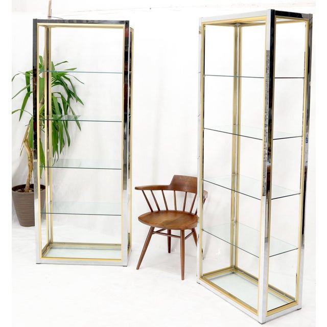 Pair of very sharp looking high quality craftsmanship étagères with glass shelves in style of Romea Riga.