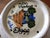 A colorful hand-painted ceramic colander by artist Robin Sterling, signed 1999 Robin Sterling was born in Harrisburg, PA...
