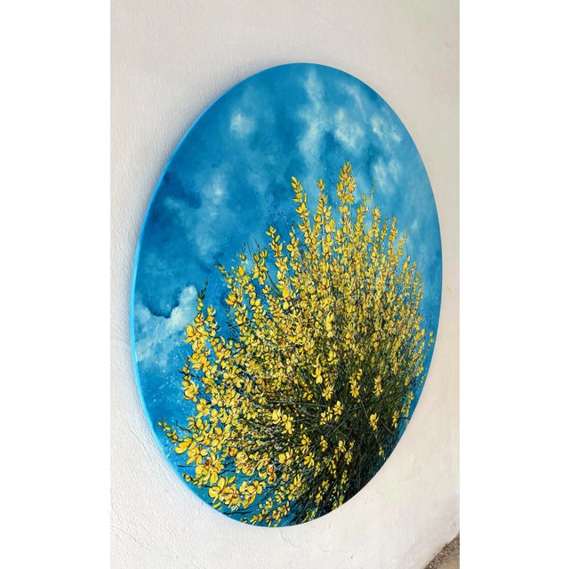 "a walk in the wild flowers of loussios gorge" is a stunning round oil painting showing happy, bright yellow flowers and...
