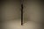 Sculptural coat stand crafted from stained ash wood and travertine, designed in the distinctive style of Ettore Sottsass...