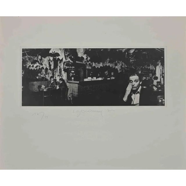 An Island in the Air is a Photograph realized by Urs Luthi in 1975. from the portfolio "Un'isola nell'aria", Vol. IV,...