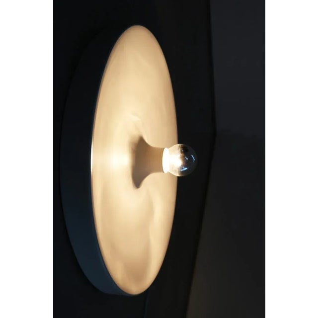 Vintage Space Age Wall Lamp from Staff, 1970s, in Very Good conditions. Designed 1970 to 1979 This piece has an...