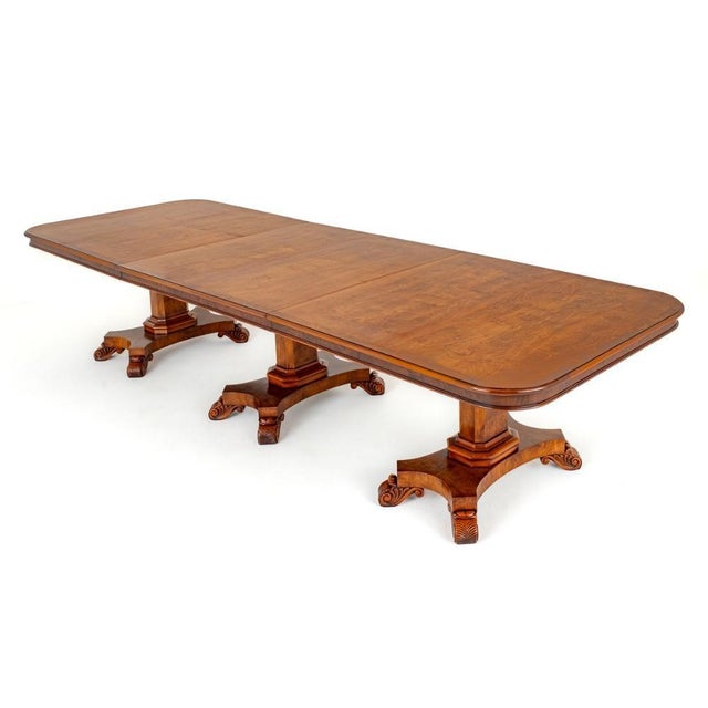 Superb Walnut Dining Table in the Manner of George Bullock. This Wonderful Table is Raised Upon 3 Pedestals Which Feature...