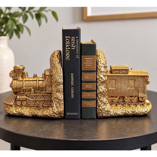 Vintage matching locomotive and caboose bookends by Universal Statuary Corporation of Chicago, marked 1964–1965. Detailed...