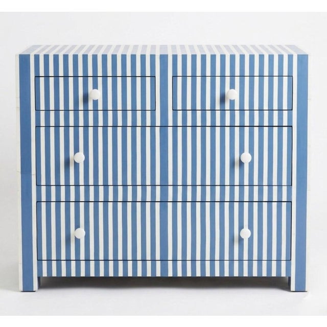 This striking vintage chest of drawers is a masterful example of Moroccan craftsmanship, blending traditional geometric...