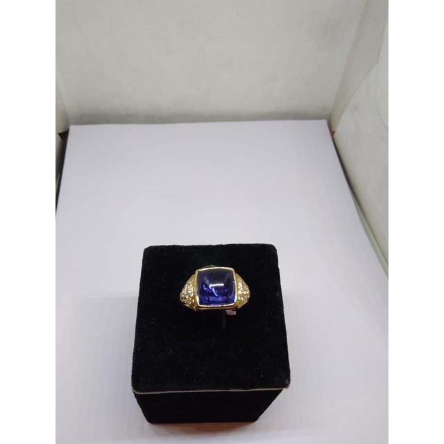 Gemstone details Gold Purity: 14K Solid Gold Diamond: 0.62cts Tanzanite: 10.90 cts 14K gold Gross weight: 5.78 grams Net...