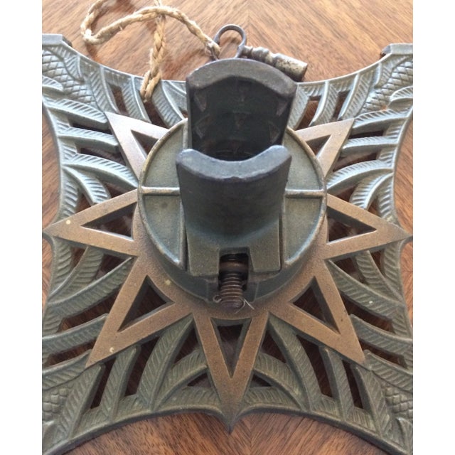 A fine French Art Deco style Christmas tree stand. This early 20th century, cast iron stand is especially crafted for...
