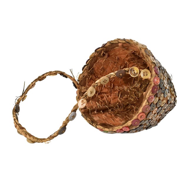 The Lega Bwami Society hat was crafted in the eastern regions of the Democratic Republic of Congo. This woven, palm fiber...