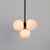Five glowing orbs float in balance - a radiant cluster of glass and charm. Minimal, magical, and just the right amount of...