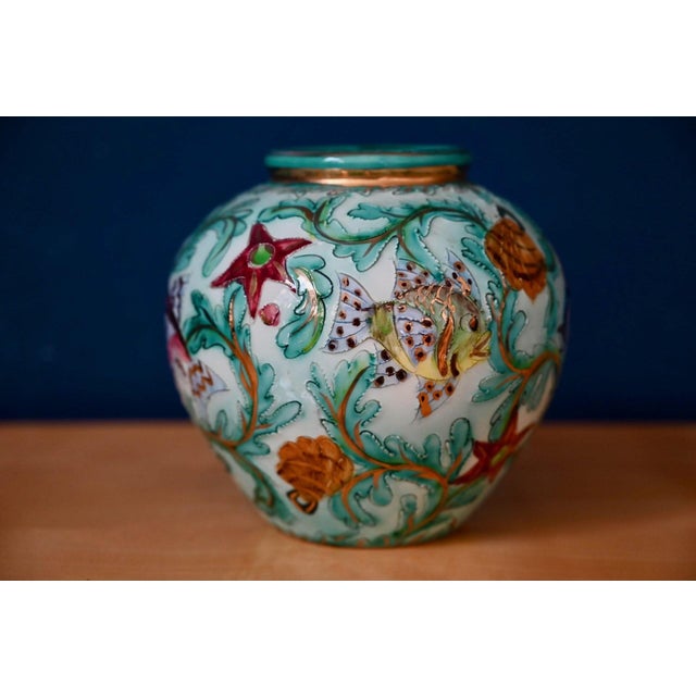 A classic spherical shape, but with exceptional colors and patterns bordering on kitsch! This vase, signed Cerart Monaco,...