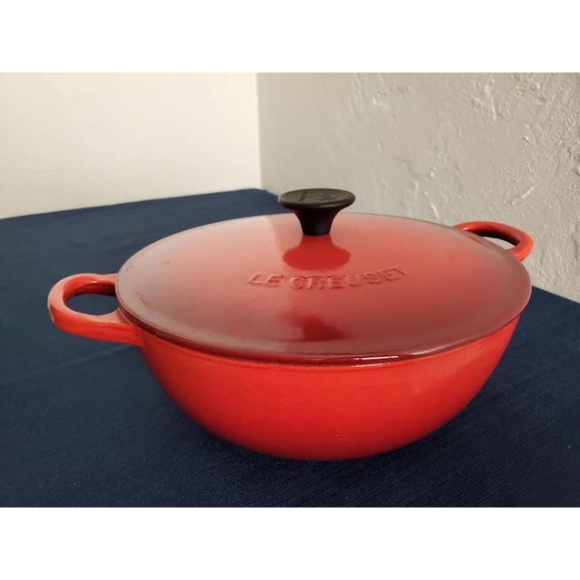 This Le Creuset #22, a Two-Toned Red Cast-Iron 2.625 Quart Soup Pot with Cast-Iron Lid is seldom used and in excellent,...