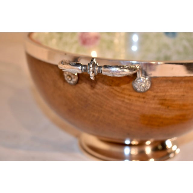 Period Edwardian treen bowl turned from oak. This bowl is lined with a lovely chintz pattern bowl and is embellished with...