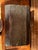 Striking vintage Chinese wooden trunk featuring raised relief (dui cai) floral motifs, pomegranates symbolizing abundance,...
