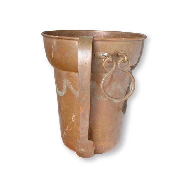 Elevate your barware collection with this vintage hammered copper ice bucket, complete with matching tongs. Featuring a...