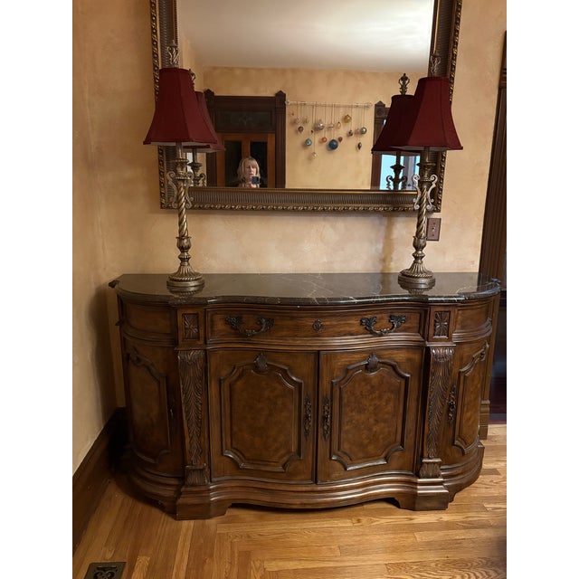 Stunning credenza by Drexel Heritage. Black marble top elevates makes this piece making it even more elegant. The marble...