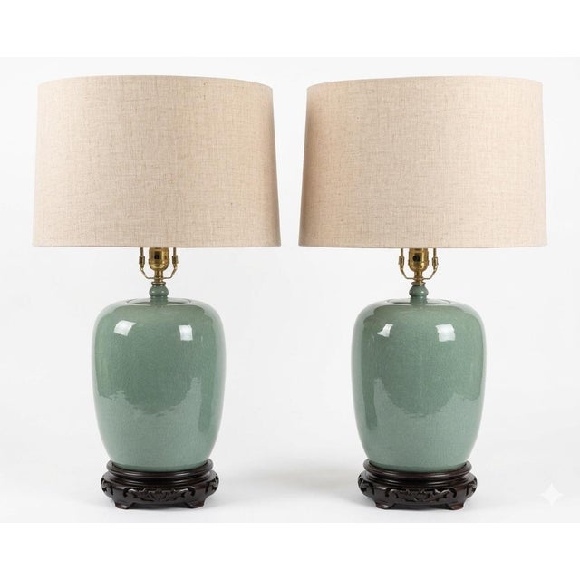 Lovely large pair of chinese crackle pottery tables with drum shades. Very heavy and beautifully glazed, these lamps never...