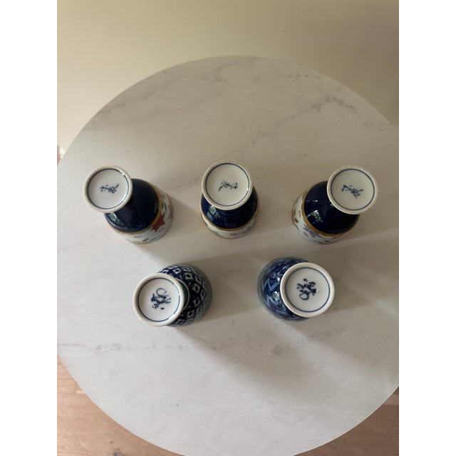 Mid 20th Century Set of 5 Japanese Porcelain Footed Sake Goblets — Hand-Painted, Arita Style — Autumn, Garden & Egyptian Motifs For Sale In New York - Image 6 of 8