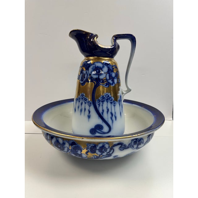 Rare Art Nouveau flow blue and gold wash basin. Manufacturers mark Rd 40844 Made in England , late 1880’s Pristine...