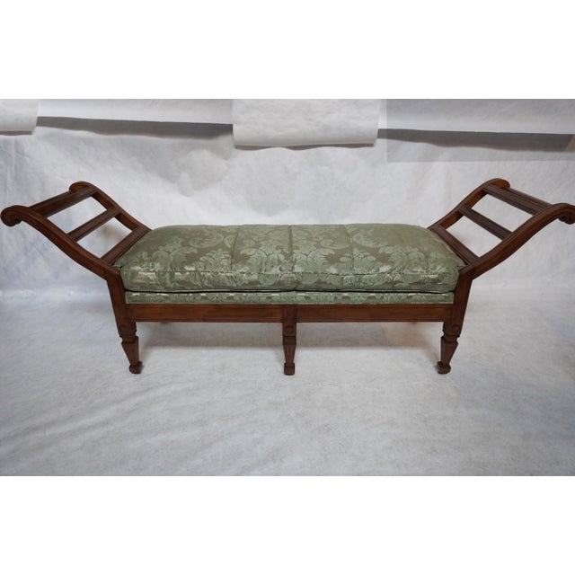 French Provincial Style Window Bench in walnut finish by Rose Tarlow. Upholstered in mint and gold damask silk. This piece...