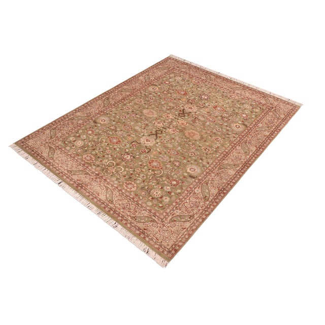 Designed with mesmerizing intricacy and gorgeous color palette, this hand-knotted masterpiece demonstrates the beauty and...