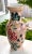 A very pretty porcelain vase decorated with hand painted chrysanthemums, butterflies and dragon fly. Convertible to lamp....