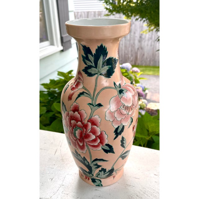 A very pretty porcelain vase decorated with hand painted chrysanthemums, butterflies and dragon fly. Convertible to lamp....