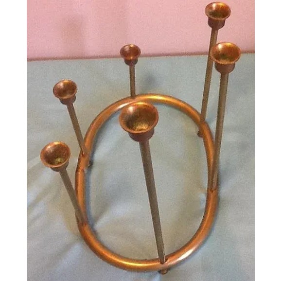 This marvelous mid century candelabra was carefully crafted in the 1960's in Taiwan. Made of beautiful burnished brass, it...