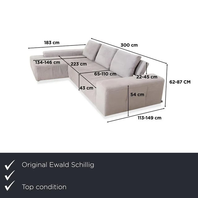 The Ewald Schillig fabric corner sofa in gray beige can be converted into a comfortable sofa bed in just a few simple...
