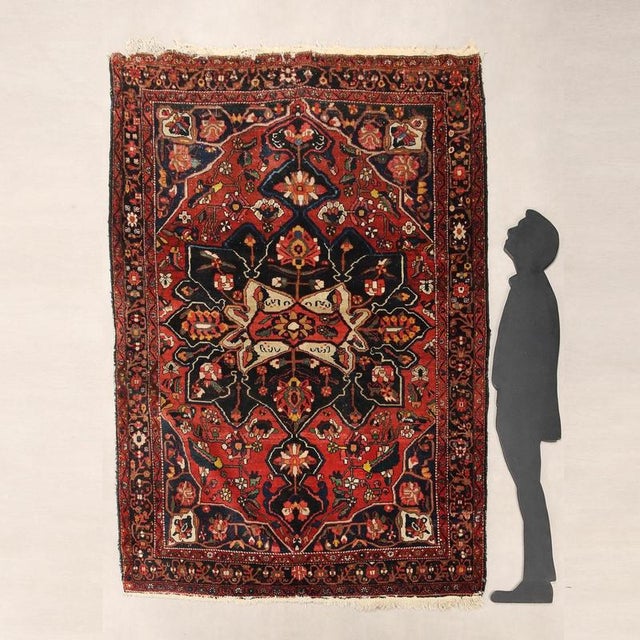 Bakhtiary rug in cotton and wool, fine knot, hand-made. This piece is attributed to the mentioned designer/maker. It has...