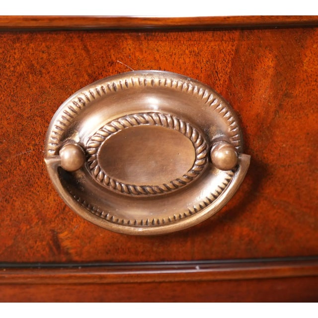 A fine quality Mahogany One Drawer Night Stand featuring hand shaped, solid mahogany details as well as dovetailed...