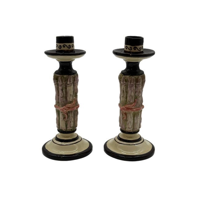A sculptural pair of studio ceramic candlesticks by Prince Ceramics, dated 1981 and marked as edition 1 of 9. Modeled as...