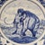 This Delft blue ceramic plate from the Netherlands features beautifully painted floral patterns and a mammoth motif,...