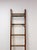 Early 20th Century Antique Wood Metal Library Ladder 7 Rung Rolling Bookcase Ladder 82" For Sale - Image 5 of 9