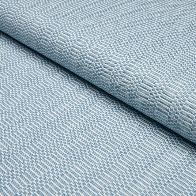 Collins incorporates thick and thin cotton yarns to create a fine ribbed pattern with a subtle stripe effect. A reversible...