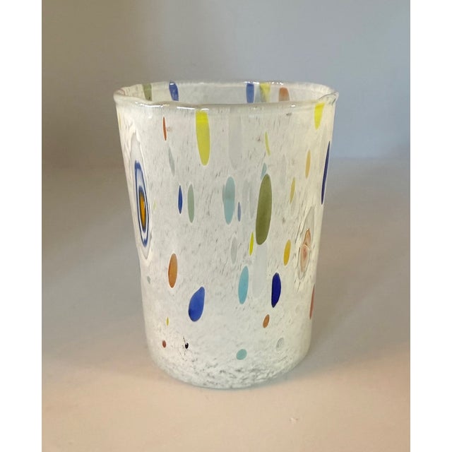 Set of 6 Murano Glass Tumblers: 3 white confetti design and 3 blue/green swirl. These Murano glass tumblers are handblown...