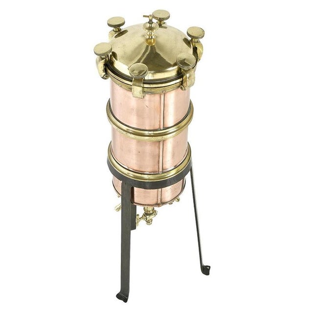 A superb example of the artisanal and scientific tradition of the turn of the 20th century, this antique copper and brass...
