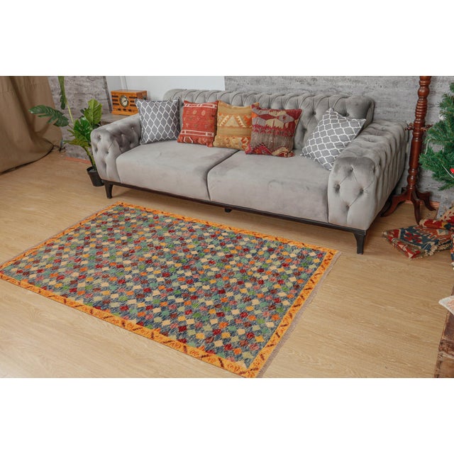 This stunning hand-knotted Afghan Balouchi rug is a captivating addition to any decor. Crafted by skilled artisans, it...