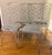 An elegant set of eight French wrought iron chairs in the manner of René Prou and dating from the late C20th. The Chairs...