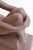 Art Deco bather style sculpture, representing a seated nude woman, clasping her folded legs, and placed on a rectangular...