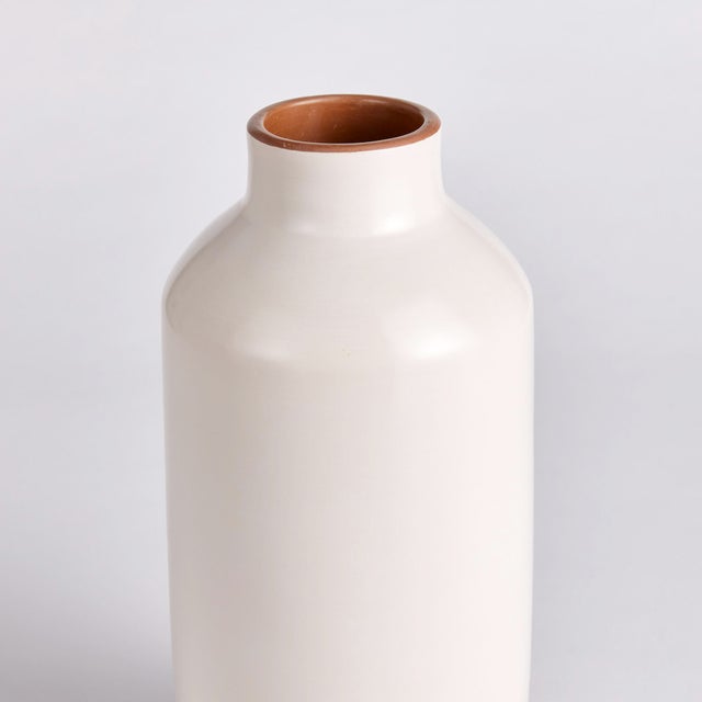 Made in Chulucanas Peru, this handcrafted vase is the product of warm climate, Peruvian clay and an artisans touch....