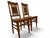 Infuse your dining space with historic, global charm with this handsome pair of vintage Dutch Colonial style chairs....