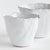 With crimped edges and natural form, this set of cachepots is a real statementmaking centerpiece. The handbrushedGold...
