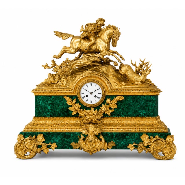 Elegant luxury desktop clock crafted with premium brass and rich malachite-inspired detailing. Designed to add...