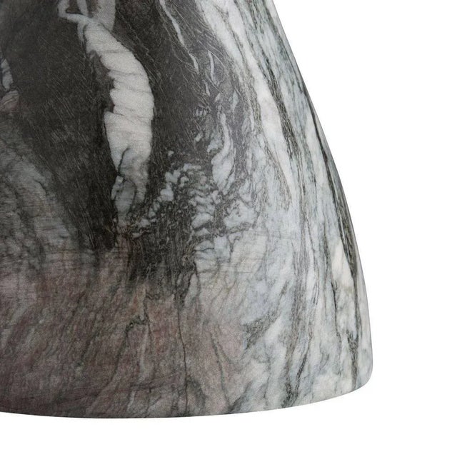 Tricky like trompe l’oeil this stunning table has a secret—though it looks to be made completely of stone lift it and...