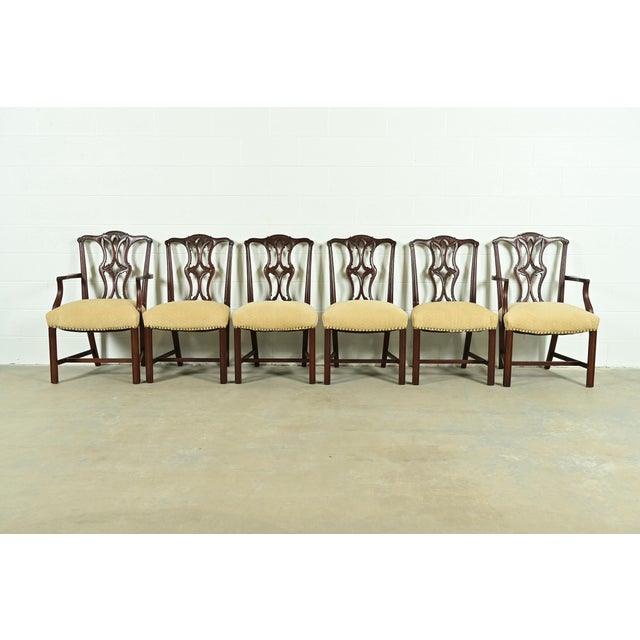 A gorgeous set of six Georgian or Chippendale style dining chairs In the manner of Baker Furniture USA, Circa 1980s Carved...