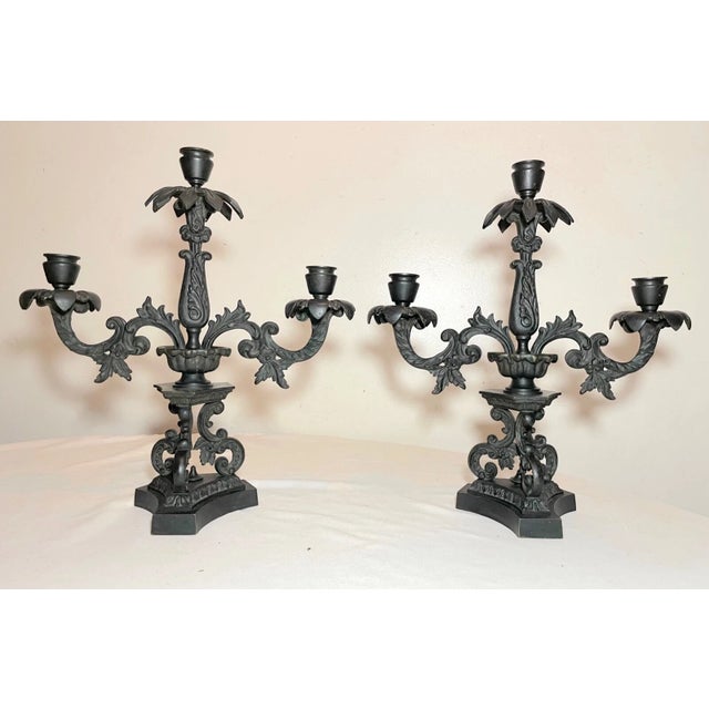 Up for sale is a very high quality pair of antique 19th century solid bronze candelabras. They are cast with very ornate...